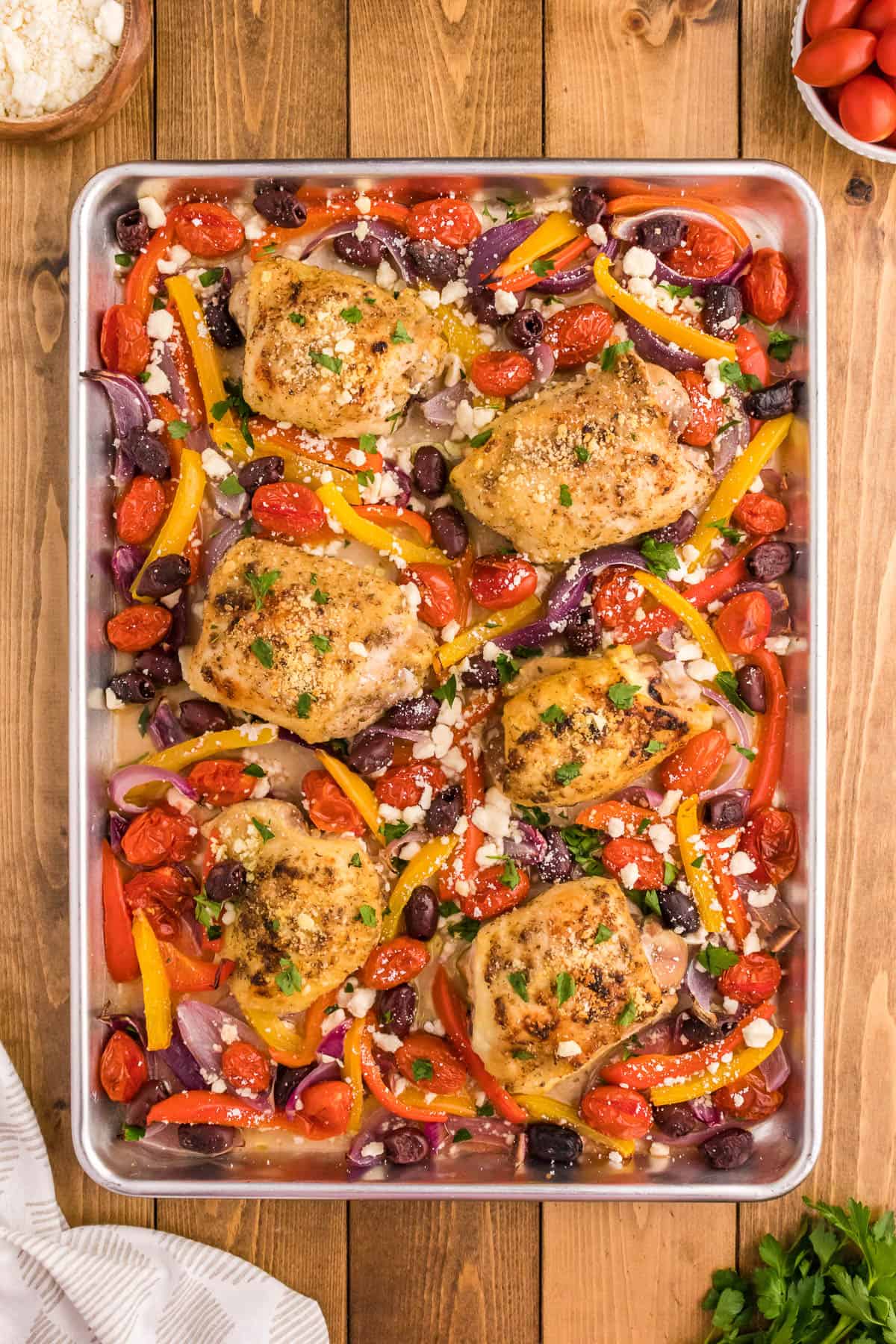 cooked greek chicken sheet pan dinner ready to be served