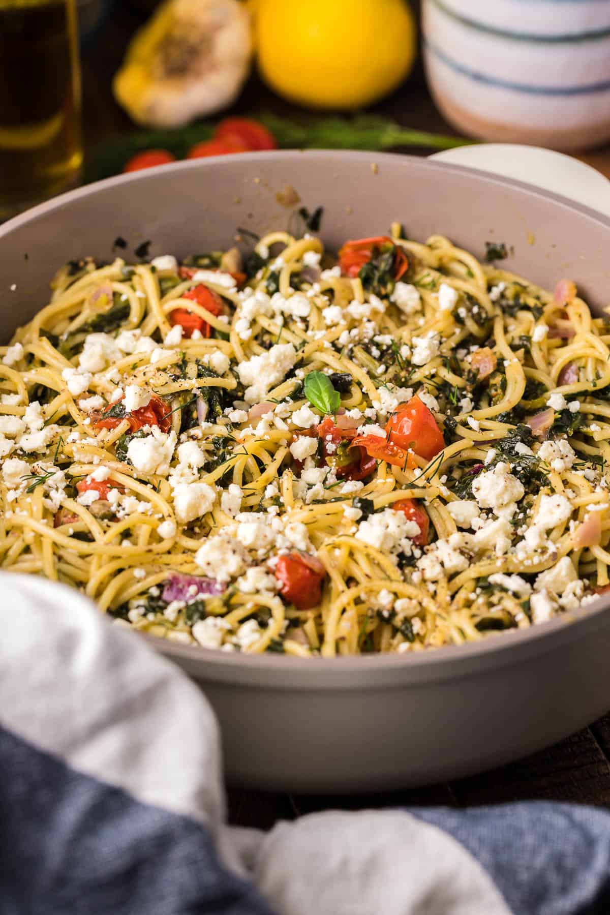 one pot greek spaghetti in a pot topped with feta 