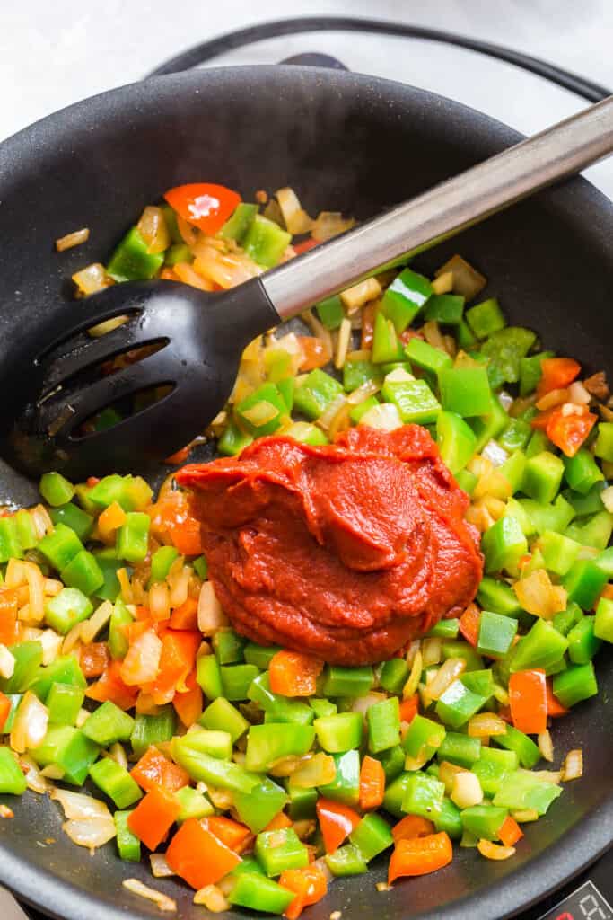 tomato paste over peppers