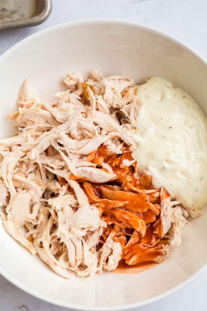 mix the rotisserie chicken with franks and ranch dressing