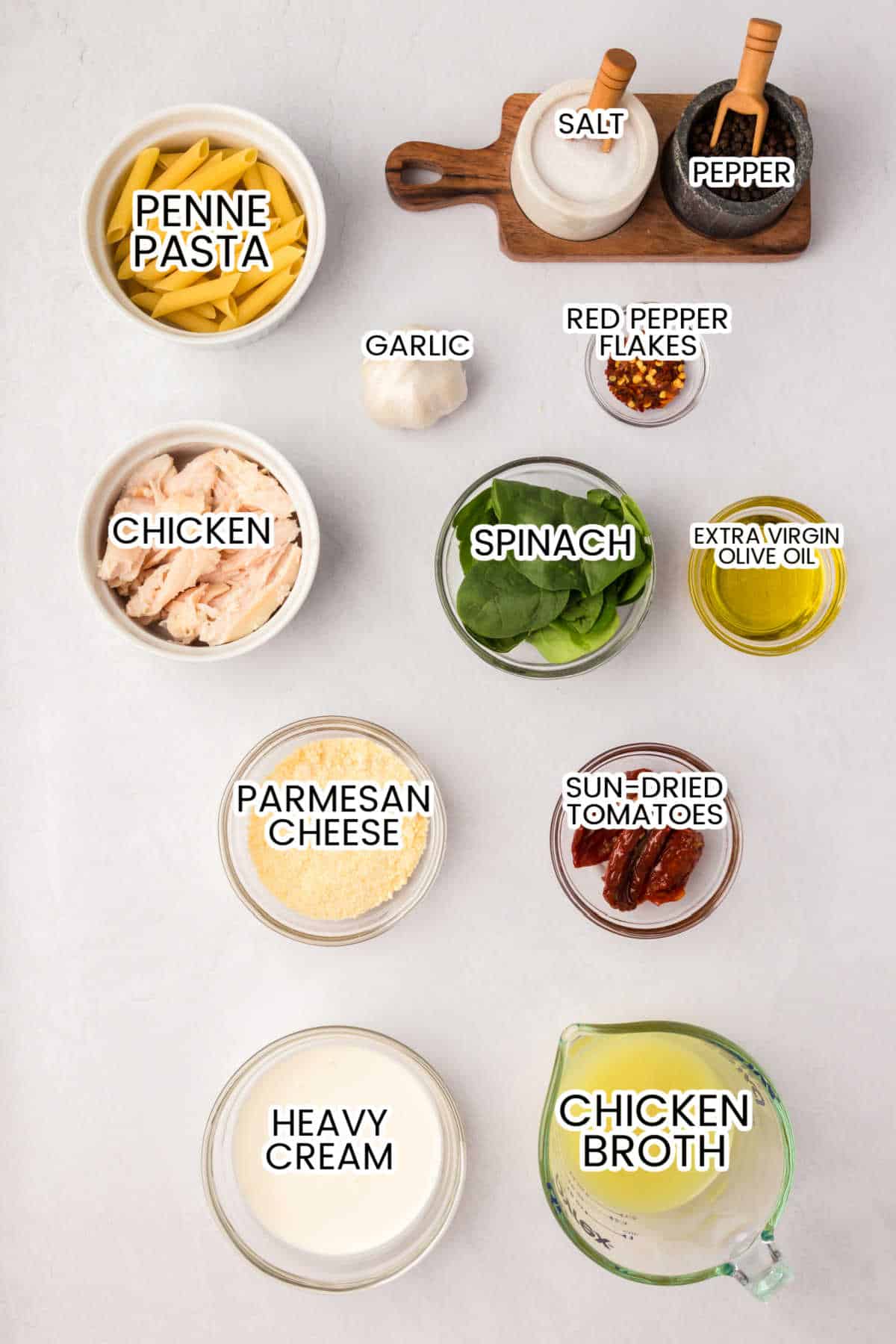 Ingredients to make chicken spinach pasta.