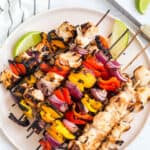 coconut lime chicken skewers with bell peppers and red onion