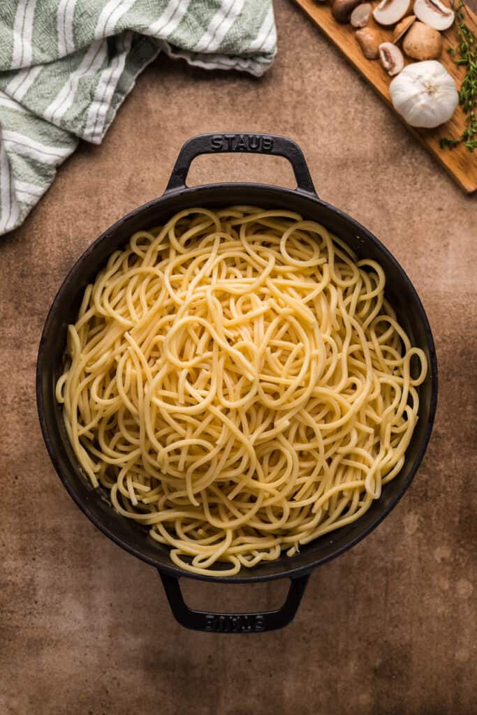 add pasta to a cast iron pan