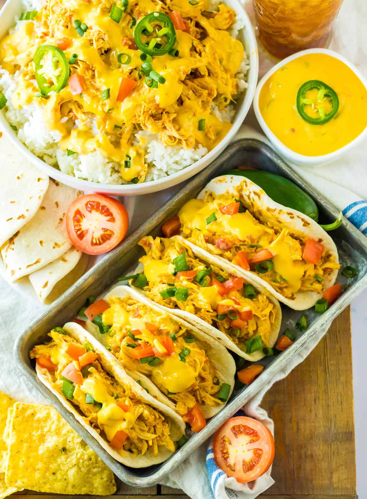 tacos stuffed with crockpot queso chicken