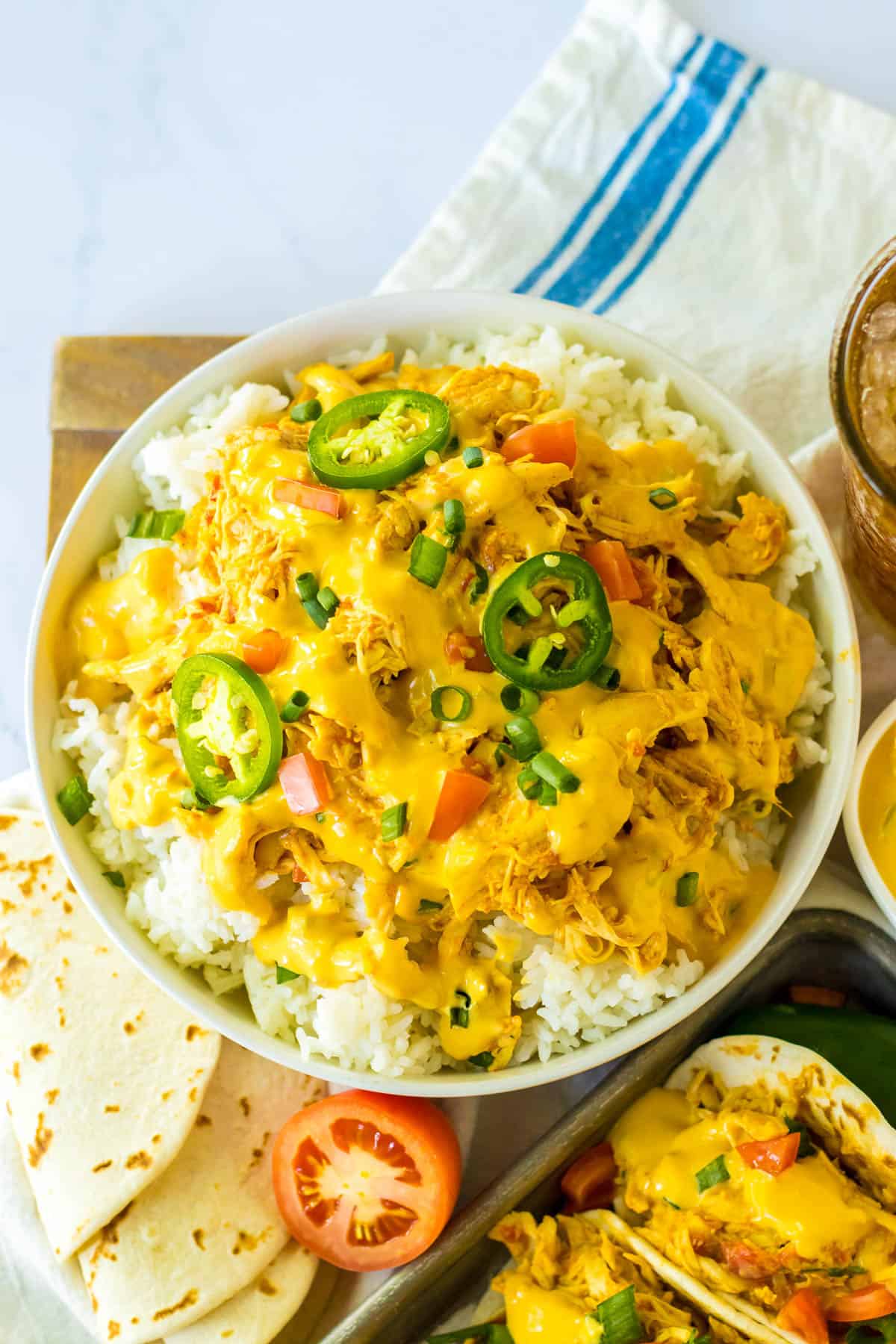 slow cooker queso chicken over rice