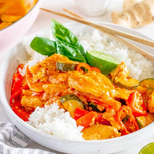 red thai curry chicken recipe with rice, basil, and lime