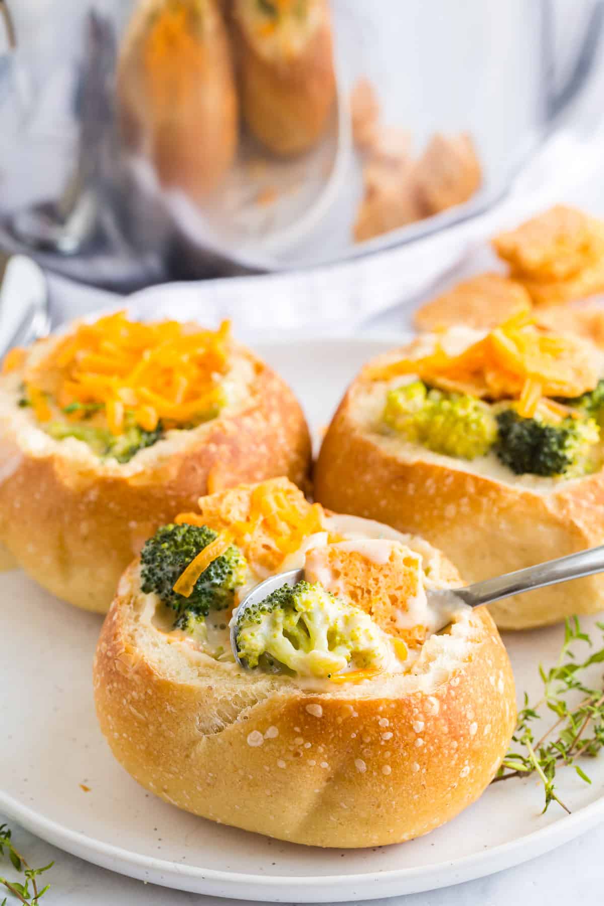 creamy broccoli cheddar soup in a sourdough bread bowl