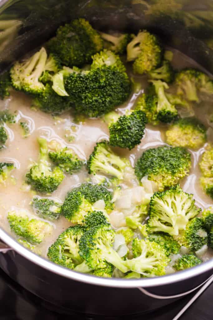 simmering the base for broccoli cheddar soup
