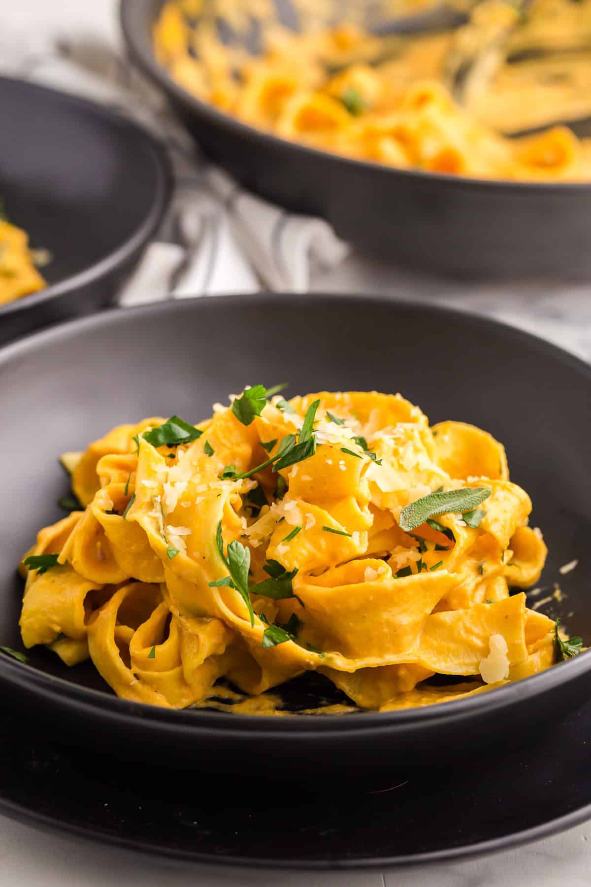 pappardelle pasta coated in a pumpkin cream sauce