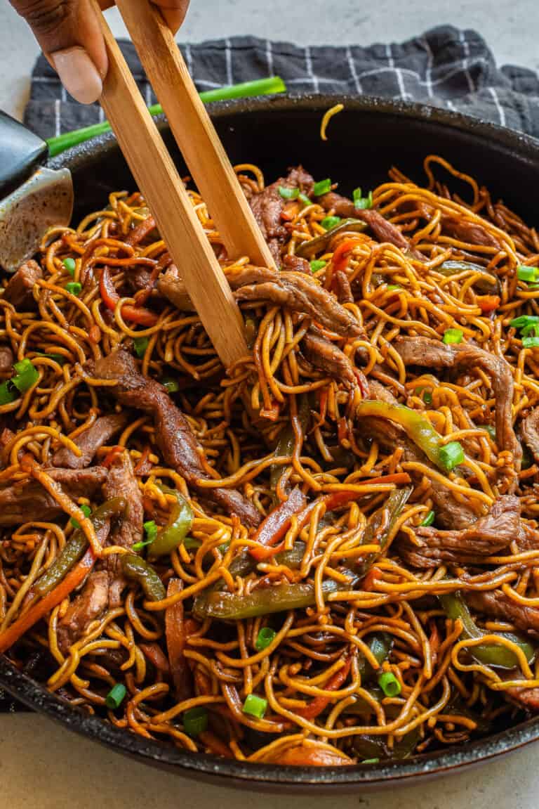 teriyaki beef and noodles with carrots, green peppers and flank steak