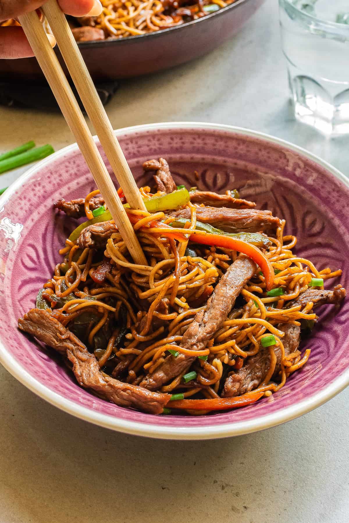 chopsticks twirling teriyaki beef noodle stir fry